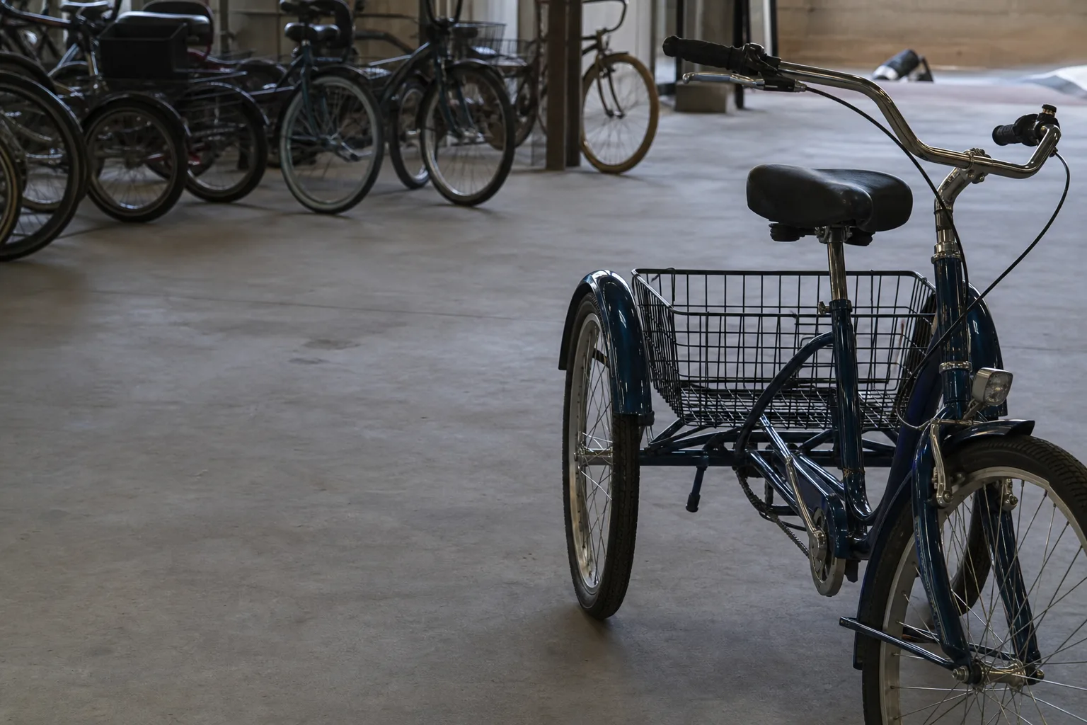 Stable at a stop, tippy in a turn. What three wheels actually change